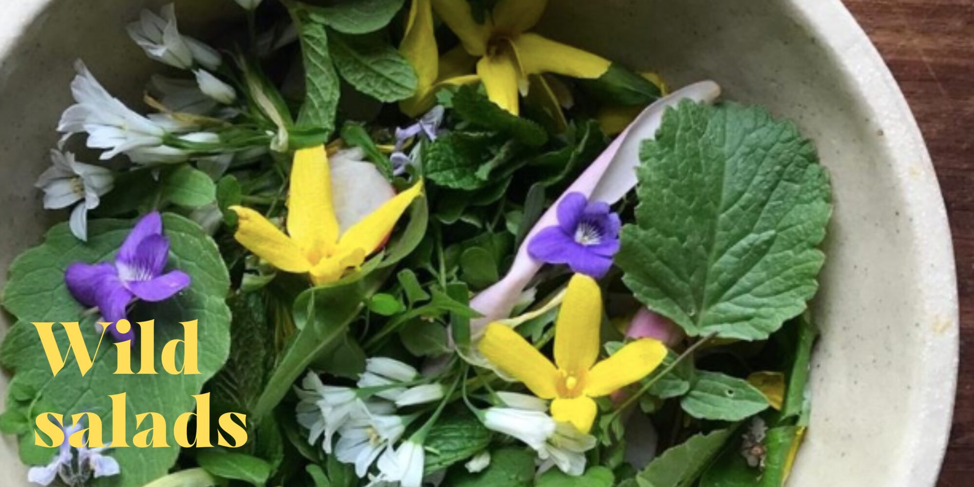A bowl of flowers and leaves